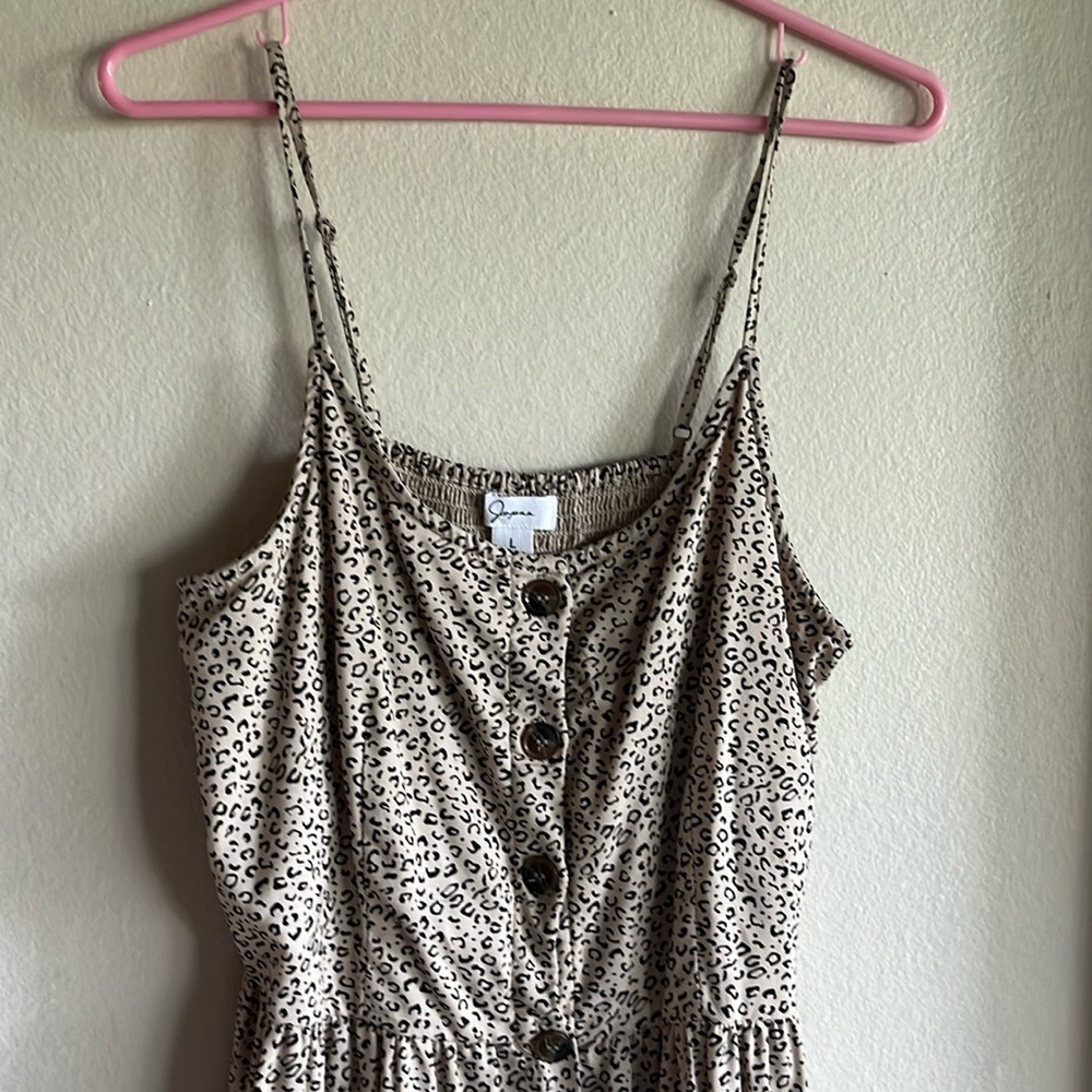 Size large 100% rayon, dress is brand new never worn, 41 inches long from top